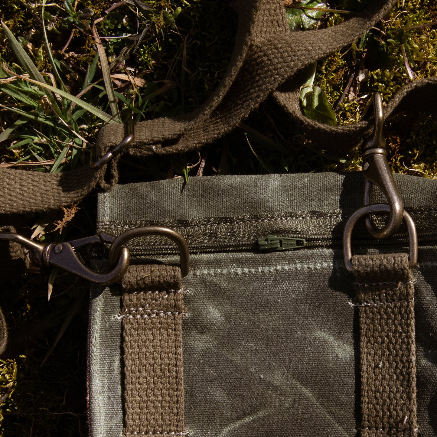The "LEGION" 3-way satchel in OLIVE